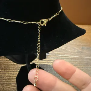 Gold Cross Orb Pendant Necklace thumbnail 2