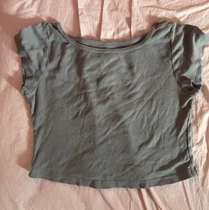 Brandy Melville teal cropped ashley shirt thumbnail 1