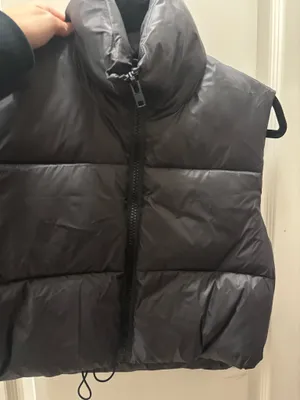 Black puffer vest thumbnail 1