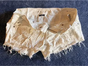 American Eagle White Denim Shorts with Floral Embroidery and Frayed Hem Size 4 thumbnail 1