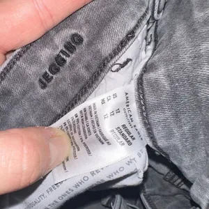 American Eagle distressed black 12 stretchy classic jeggings thumbnail 2