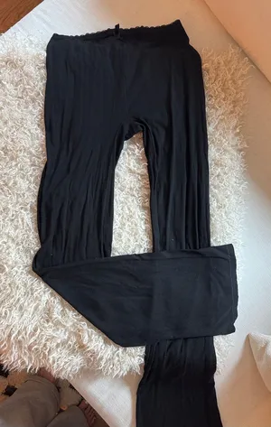 SKIMS Pants Soft Lounge Lace in size small. Color: soot 91% modal 9% spandex thumbnail 1