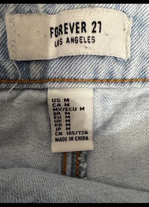 Forever 21 light Denim belted Skort skirt - size Medium. Gently warn & excellent condition. Measurements approximately 13” waste x 15” long. Non smoking home. priced to sell at as is condition. Don’t like my price, make reasonable offer! And thank you for checking my closet. thumbnail 3