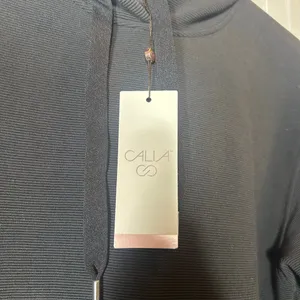 CALIA by Carrie Underwood Black Oversized Side Slit Hoodie thumbnail 4