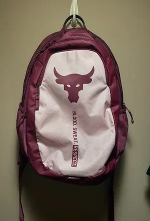 Under Armour Project Rock Brahma Backpack in maroon and pink thumbnail 1