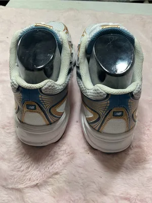 New Balance White Sneakers with Gold and Blue Accents 153 thumbnail 4