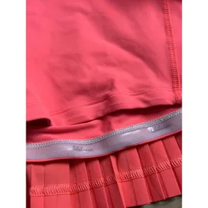 EUC Women Lululemon Pleat To Street Skirt II Grapefruit neon tennis skirt Size 8 thumbnail 5