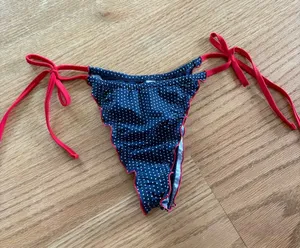 Frankie's Bikinis Navy Polka Dot Bikini Bottoms with Red Ties thumbnail 1
