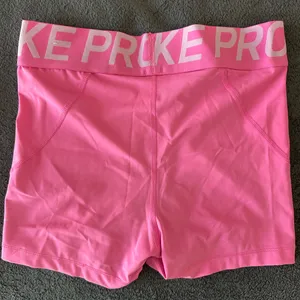 Nike Women's Bright Pink Athletic Shorts thumbnail 2