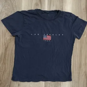 Brandy Melville Los Angeles Flag Short Sleeve Shirt Women’s Small thumbnail 1