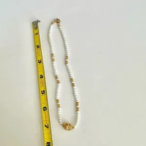 Faux pearl gold tone beaded necklace thumbnail 8