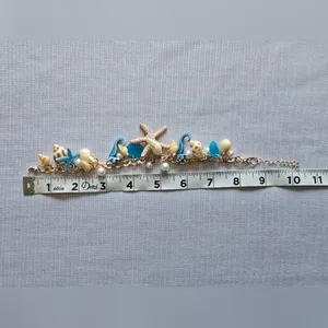 Ocean-Themed Charm Bracelet‎ with Blue and Gold Color Accents thumbnail 7