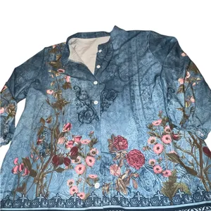 Blue faded look top with floral design. thumbnail 7