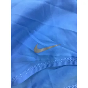 Nike Womens Dri-FIT Running Shorts Blue Reflective Swoosh Elastic Waist Athletic thumbnail 2