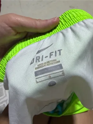 Nike Women's Neon Yellow-Green Running Shorts with Pink & Teal Trim large thumbnail 7