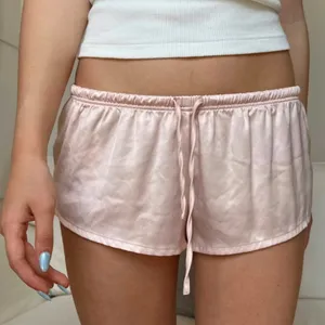 Brandy Melville pink satin shorts thumbnail 1