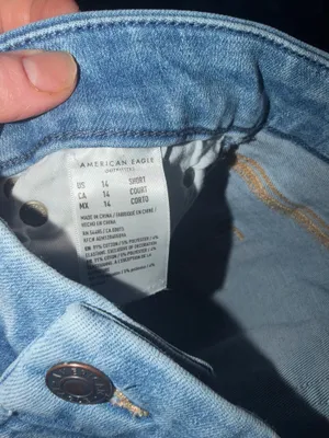 NWOT American Eagle distressed super high-rise jegging stretch light wash 14. thumbnail 7