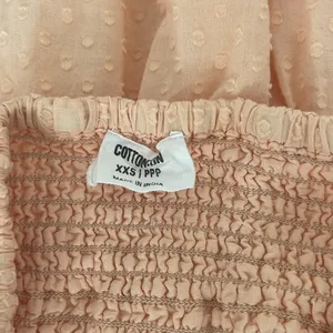 Cotton On skirt. Elastic waist with tie up front design. Color- peach. Size XXS thumbnail 5