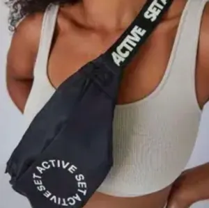 SET Active x Revolve Black Fanny pack belt bag with White Logo Circle, size 13x6 thumbnail 1