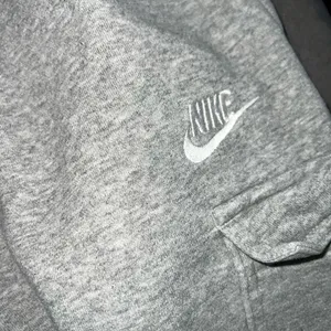 Nike Sportswear Club Fleece Cargo Jogger Sweatpants in Gray Size Medium thumbnail 15