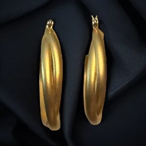 Brushed gold tone intertwined hoop earrings thumbnail 2