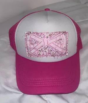 Pink and white trucker hat with floral patch thumbnail 1