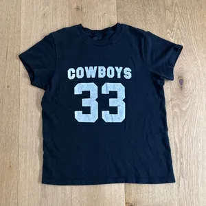 Brandy Melville J Galt Cowboys 33 Baby Tee SIze OS in Black White thumbnail 1