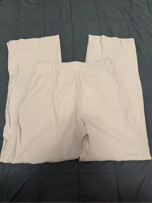 Tan high-waisted trousers with a relaxed fit. Size: 10 #highwaisted #trousers thumbnail 3