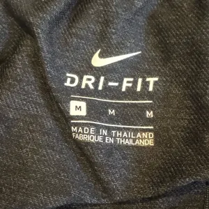 Nike Women's Athletic Shorts in Dark Gray thumbnail 3