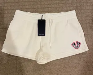 True Religion Winter White Lounge Shorts with Pink Logo Patch thumbnail 1