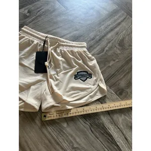 NEW Alphalete Woman’s Varsity Short - Tan ,size XS thumbnail 13