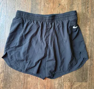 Nike Women’s Black Athletic Running Shorts with White Swoosh thumbnail 1