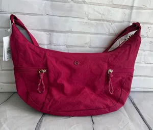 lululemon athletica Slouchy Sling Bag in Berry Rumble (BRML) thumbnail 1