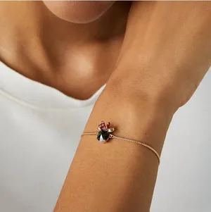 Kate Spade + Disney Minnie Mouse Gold Black Red Bolo Bracelet One Size thumbnail 1