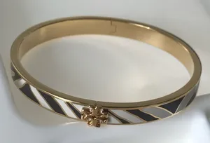 NWOT Tory Burch Gold and Black Striped Bracelet thumbnail 1