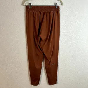 Nike Dri Fit Rip Stop Jogger Womens Size Medium Terracotta Dark Orange thumbnail 3