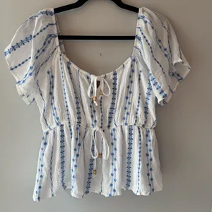 BUCKle- 33 Costal -Women's White Peasant Blouse with Blue Embroidery thumbnail 1