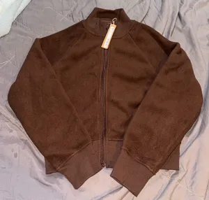 SKIMS FLEECE LOUNGE JACKET 'COCOA' thumbnail 1