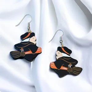 Wooden Halloween witch on a broom dangle earrings thumbnail 1