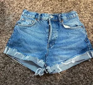 Reformation Frayed Hem High-Rise Denim Shorts - Blue thumbnail 1