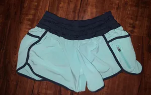 Lululemon Teal and navy shorts thumbnail 1
