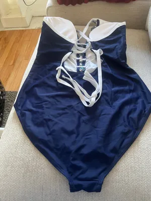 Mbjl Dive into style with this elegant navy and white one- piece swimsuit. Perfect for a chic beach look. thumbnail 7
