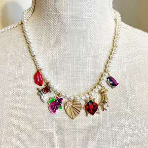 👄Betsey Johnson Faux Pearl Charm Necklace - Ladybug, Lips, Flower & Cowboy Boot thumbnail 1