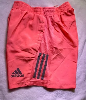 adidas Coral Pink Athletic Shorts with Dark Stripe Accents thumbnail 1