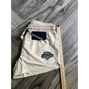NEW Alphalete Woman’s Varsity Short - Tan ,size Small thumbnail 8
