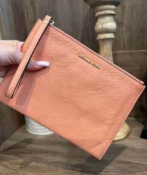 MICHAEL KORS Peach Leather Wristlet Clutch thumbnail 1