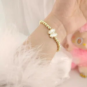 Kendra Scott Haley Bow Gold Stretch Bracelet thumbnail 1