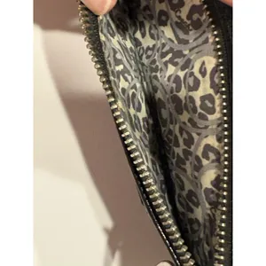 Coach Poppy Black Patent Zip-Around Wallet Wristlet featuring thumbnail 7