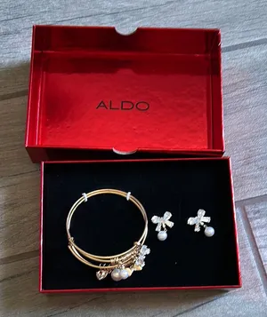 Aldo Red bow box earring and bracelet set thumbnail 1