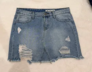 blue denim skirt with ripped details, size M thumbnail 1